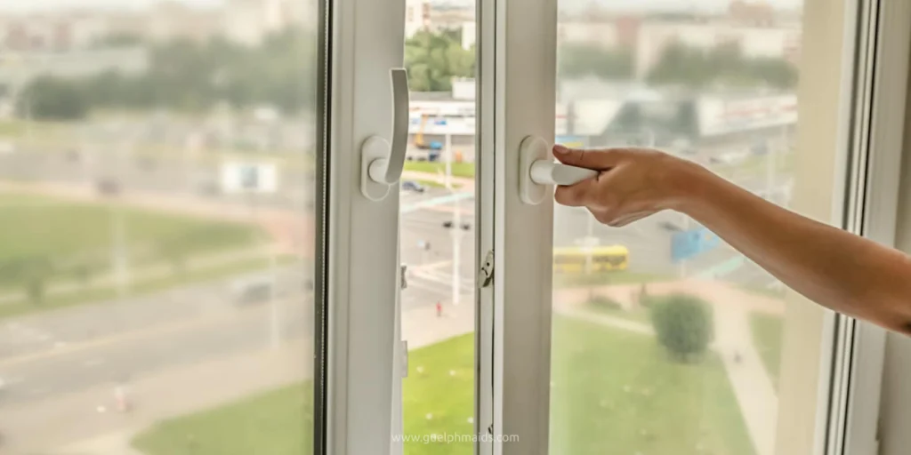 Woman opening a window